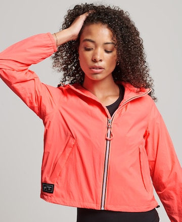 Superdry Prehodna jakna | oranžna barva: sprednja stran
