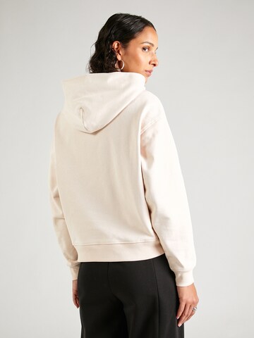 Sweat-shirt 'Badge' Calvin Klein Jeans en beige