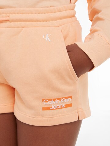 Regular Pantalon 'Hero' Calvin Klein Jeans en orange