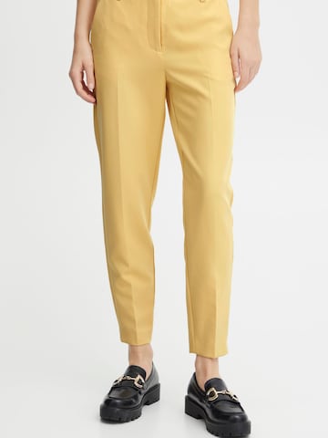 ICHI Slim fit Pleated Pants 'IHLEXI' in Yellow: front