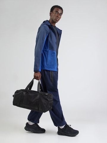 COLUMBIA - Chaqueta de montaña 'Pouring Adventure' en azul