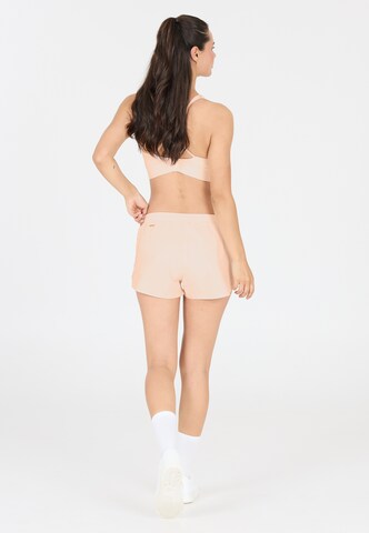 Athlecia Regular Workout Pants 'Alain' in Beige
