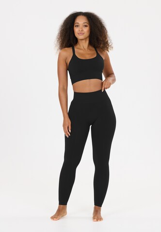 Athlecia Skinny Leggings 'Nagar V4' in Black: front