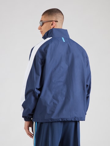 ELLESSE Демисезонная куртка в Синий