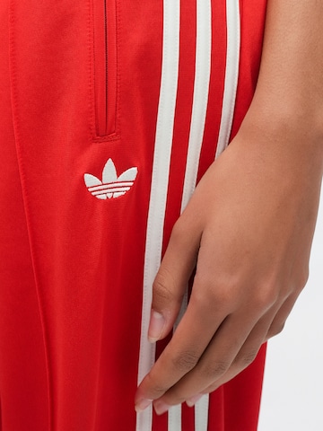 Loosefit Pantalon 'Firebird' ADIDAS ORIGINALS en rouge