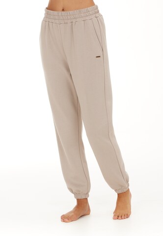 Athlecia Regular Workout Pants 'Aya' in Beige: front