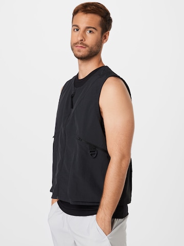 Reebok Sportbodywarmer in Zwart: voorkant