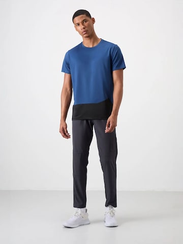 T-Shirt fonctionnel Tommy Life en bleu