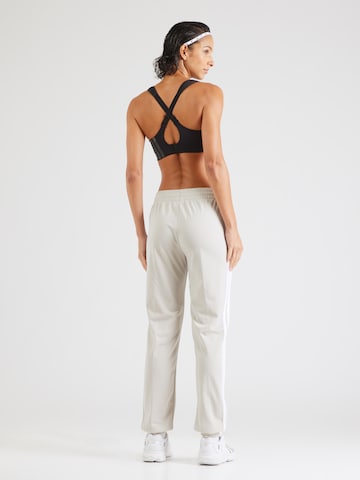 Tapered Pantaloni sportivi di ADIDAS SPORTSWEAR in bianco