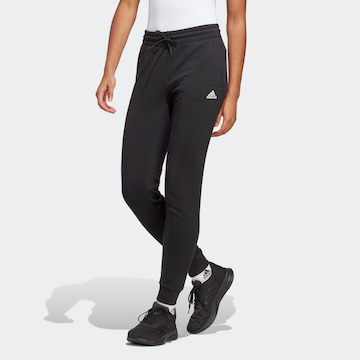 ADIDAS SPORTSWEAR Tapered Workout Pants 'Essentials' in Black: front