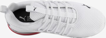 Chaussure de course 'Axelion' PUMA en blanc