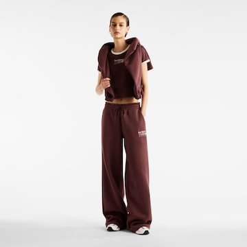 Wide leg Pantaloni 'Trackside' di new balance in rosso