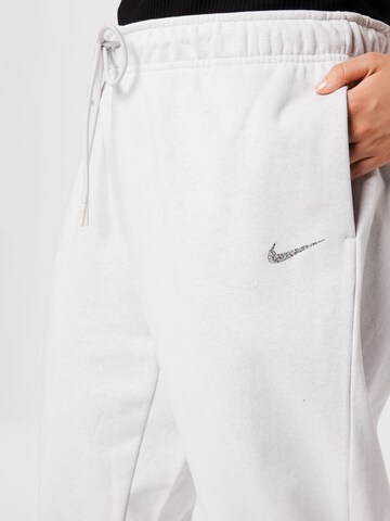 Nike Sportswear Tapered Nadrág - kék