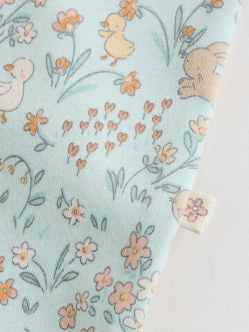 Next - Pijama entero/body en azul