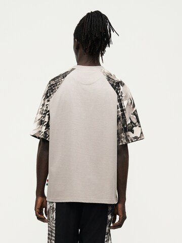 T-Shirt Carlo Colucci en gris : derrière