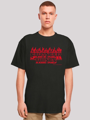 T-Shirt 'Stranger Things Flames Netflix TV Series' F4NT4STIC en noir : devant