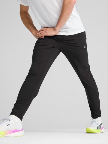 PUMA - Tapered Pantalón deportivo 'Velocity' en negro: frente