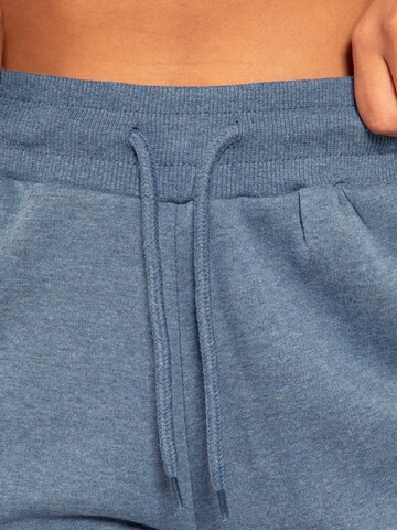 Effilé Pantalon de sport 'Amelia' Smilodox en bleu