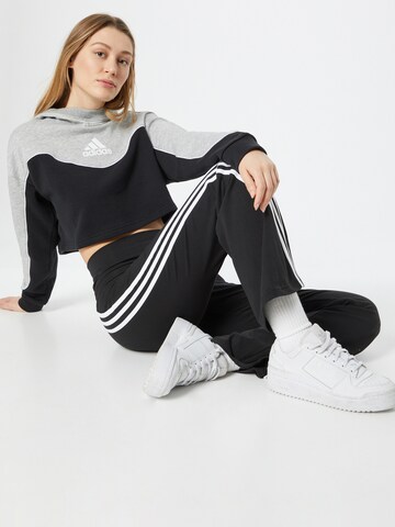 ADIDAS SPORTSWEAR Urheilullinen collegepaita värissä musta