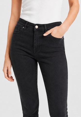Slimfit Jeans di Elara in nero