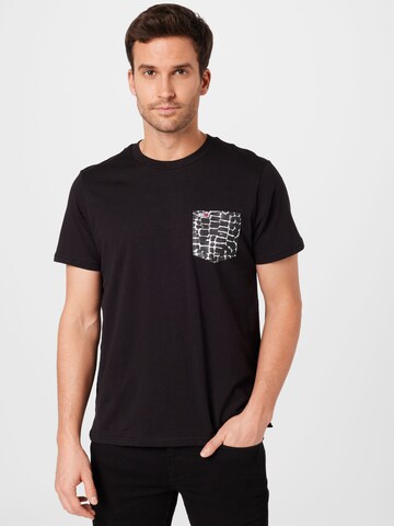 Tricou de la Tommy Jeans pe negru: față