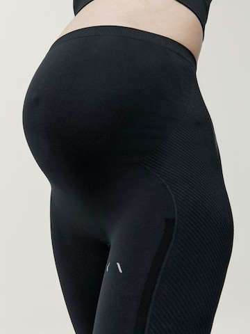 Born Living Yoga Skinny Leggings 'Mommy Line' in Zwart