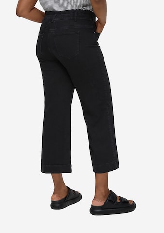 TRIANGLE Wide leg Jeans in Black