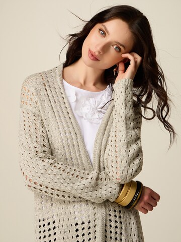 Cappotto in maglia di oltre in argento