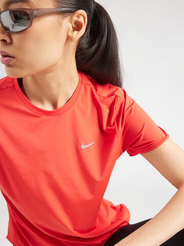 NIKE Functioneel shirt 'SWIFT' in Oranje