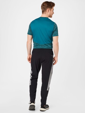 ADIDAS SPORTSWEAR Regular Workout Pants 'Train Icons ' in Black