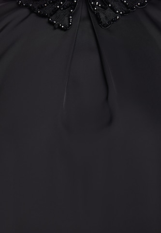 faina - Blusa 'GLOW' en negro