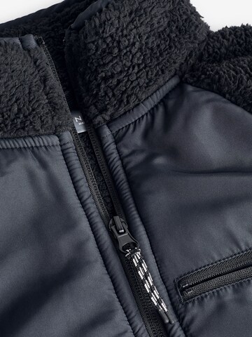 Next - Chaqueta polar en negro