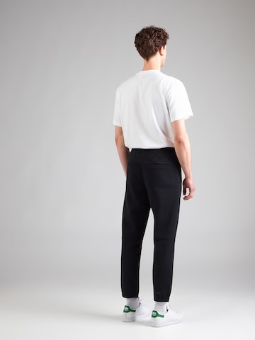 BOSS Ozke Hlače | črna barva