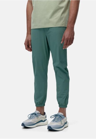 Born Living Yoga Tapered Weatherproof pants 'Minho' in Green: front