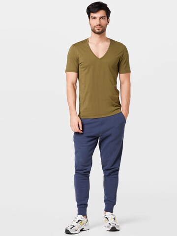 žalia DRYKORN Standartinis modelis Marškinėliai 'Quentin'