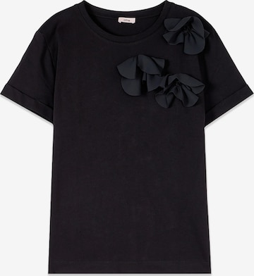 oltre - Camiseta en negro: frente