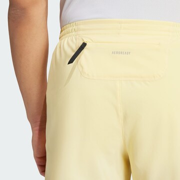Regular Pantalon de sport 'Own The Run' ADIDAS PERFORMANCE en jaune