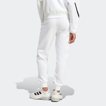 ADIDAS SPORTSWEAR Конический (Tapered) Спортивные штаны 'W Z.N.E. PT' в Белый