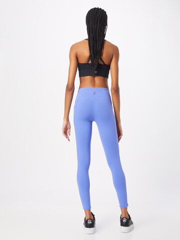 SKECHERS Skinny Workout Pants in Blue