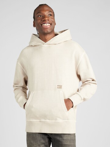 Tommy Jeans - Sudadera 'Essential' en beige: frente