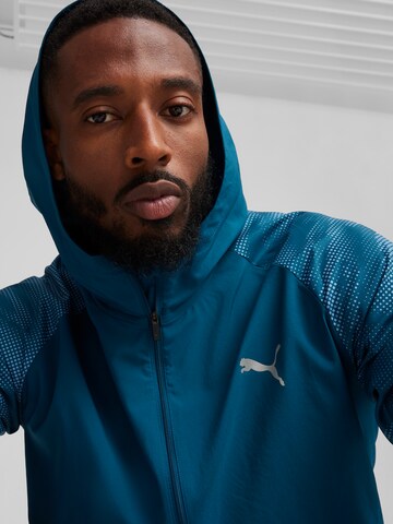 PUMA Športna jakna 'RUN FAVORITE AOP' | modra barva