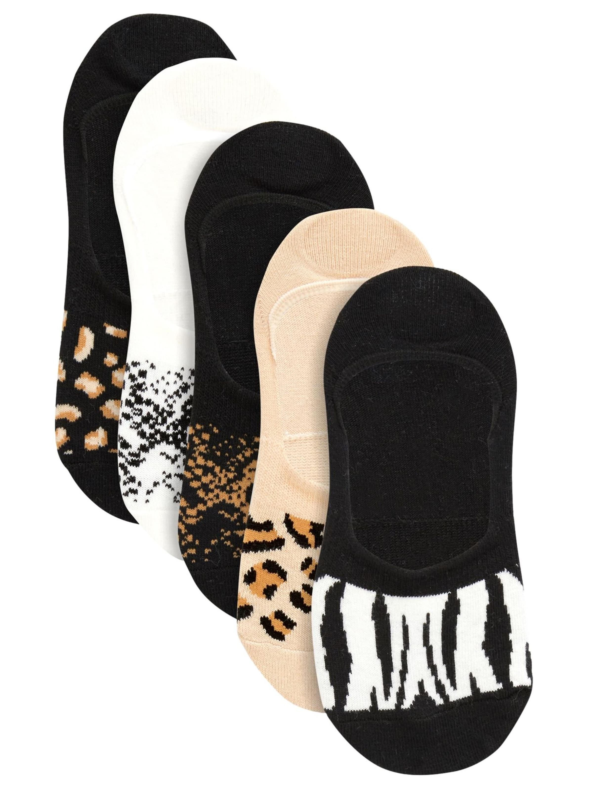 Next Sockor i brun: framsida