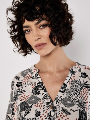 Robe Apricot en argent