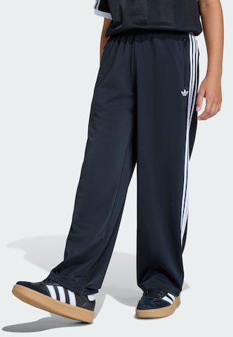 ADIDAS ORIGINALS - Loosefit Calças 'Firebird' em preto: frente