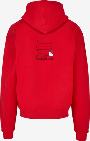 Merchcode Sweatshirt 'Peanuts - Peekaboo' in Rood