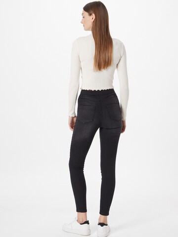 Skinny Jeans 'JAC JOSSA' di In The Style in nero