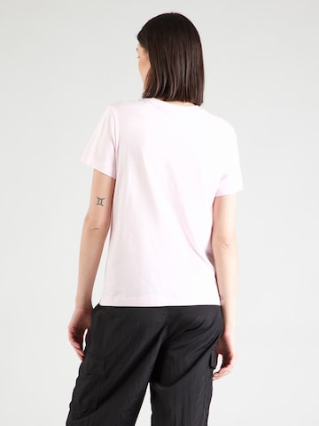 Maglietta di Champion Authentic Athletic Apparel in rosa