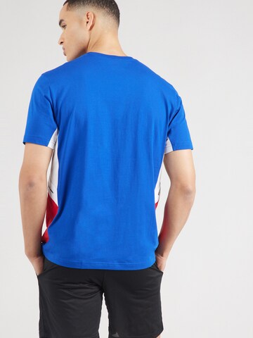 Maglietta di Champion Authentic Athletic Apparel in blu