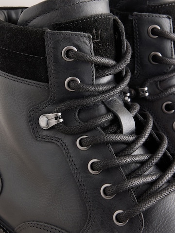 Next - Botas con cordones en negro