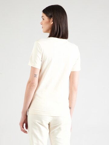 Maglietta di Champion Authentic Athletic Apparel in giallo